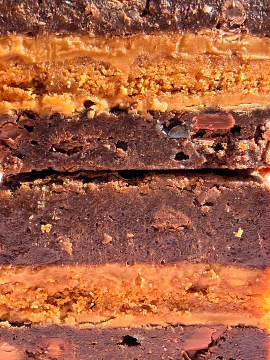 Gooey chocolate brownies stuffed with Biscoff biscuits and Biscoff spread