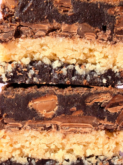 Fudgy chocolate brownies stuffed with a layer of coconut and milk chocolate
