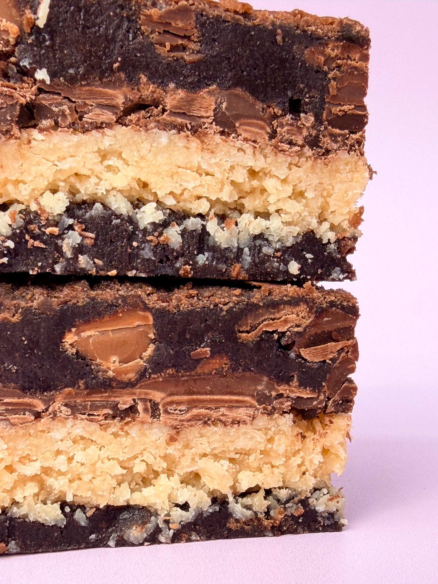 Fudgy chocolate brownies stuffed with a layer of coconut and milk chocolate