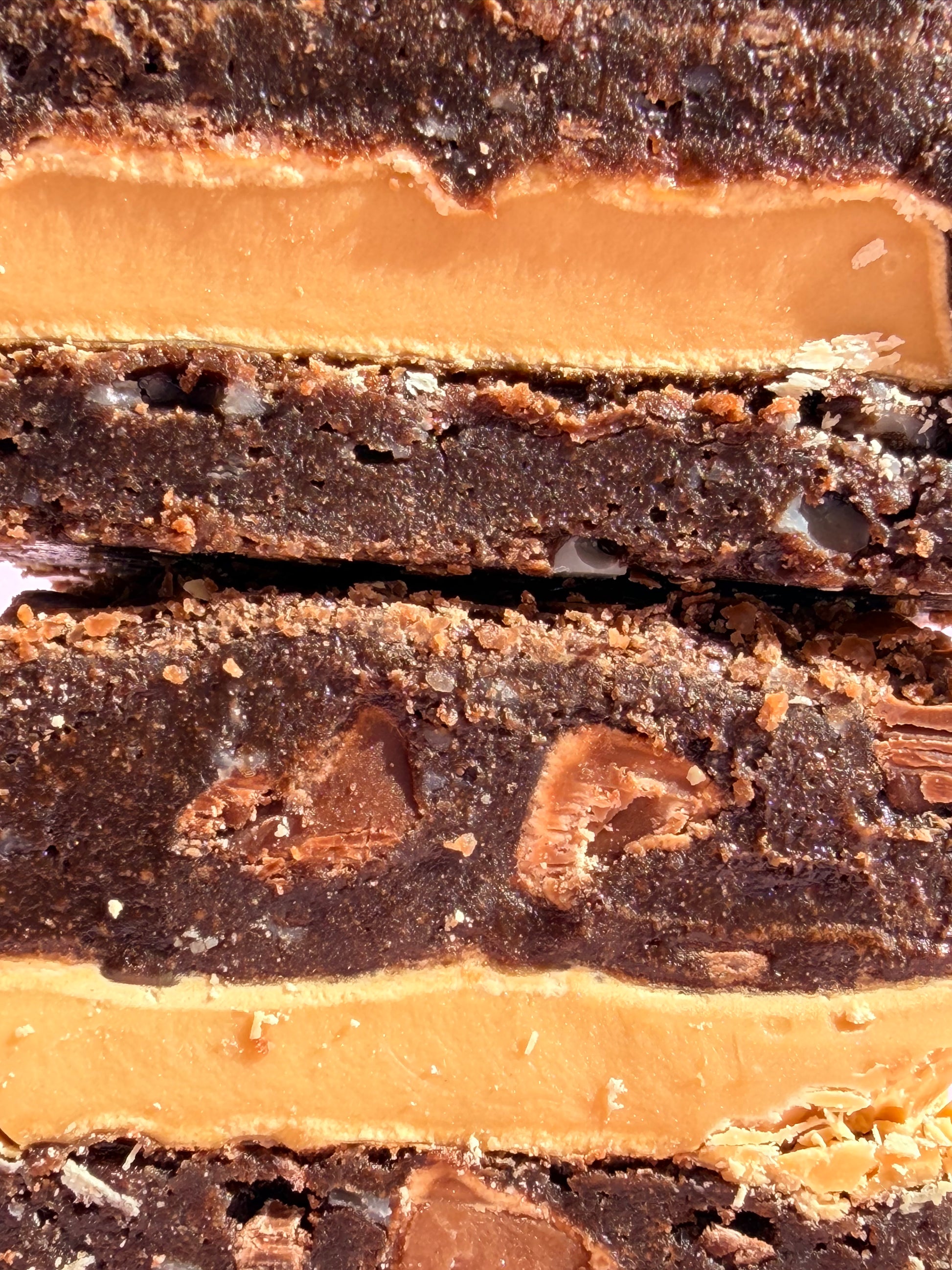 Fudgy chocolate brownies stuffed with Caramilk chocolate blocks