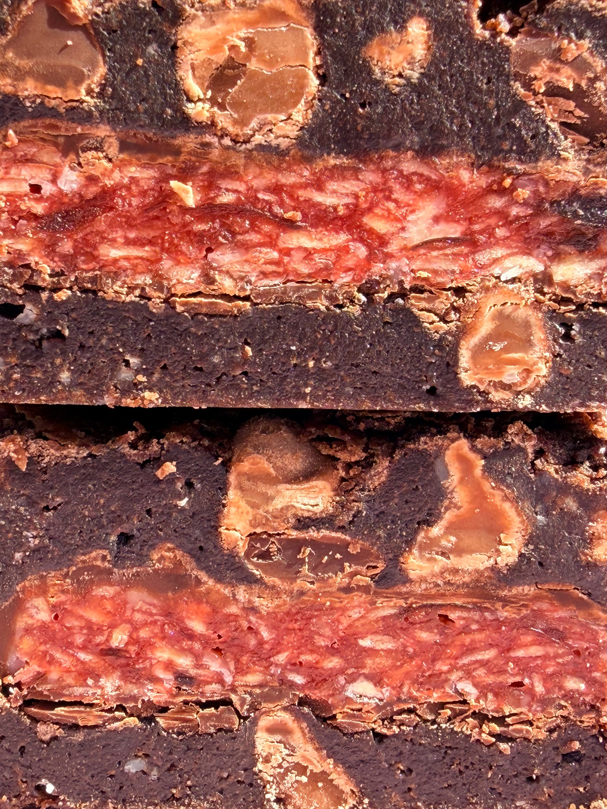 Fudgy chocolate brownies stuffed with a layer of Cherry Ripe chocolate bars