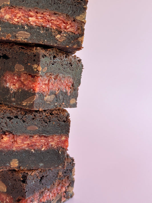 Fudgy chocolate brownies stuffed with Cherry Ripe