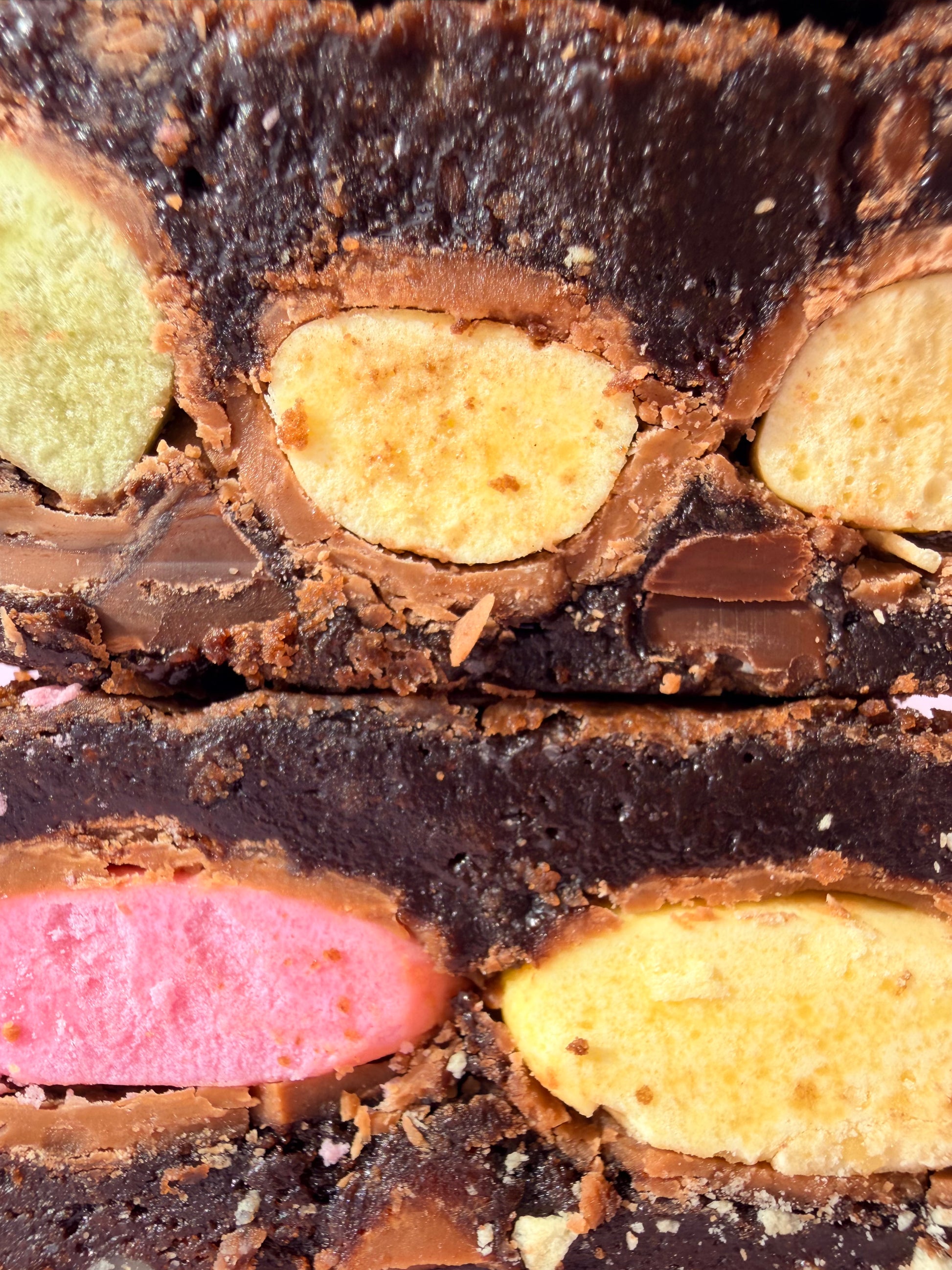 Fudgy chocolate brownies stuffed with a layer of Clinkers