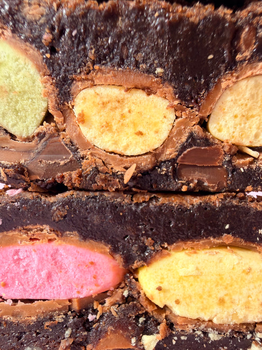 Fudgy chocolate brownies stuffed with a layer of Clinkers