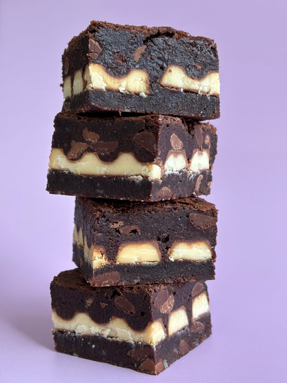 Fudgy chocolate gluten-friendly brownies stuffed with a layer of Kinder chocolate bars