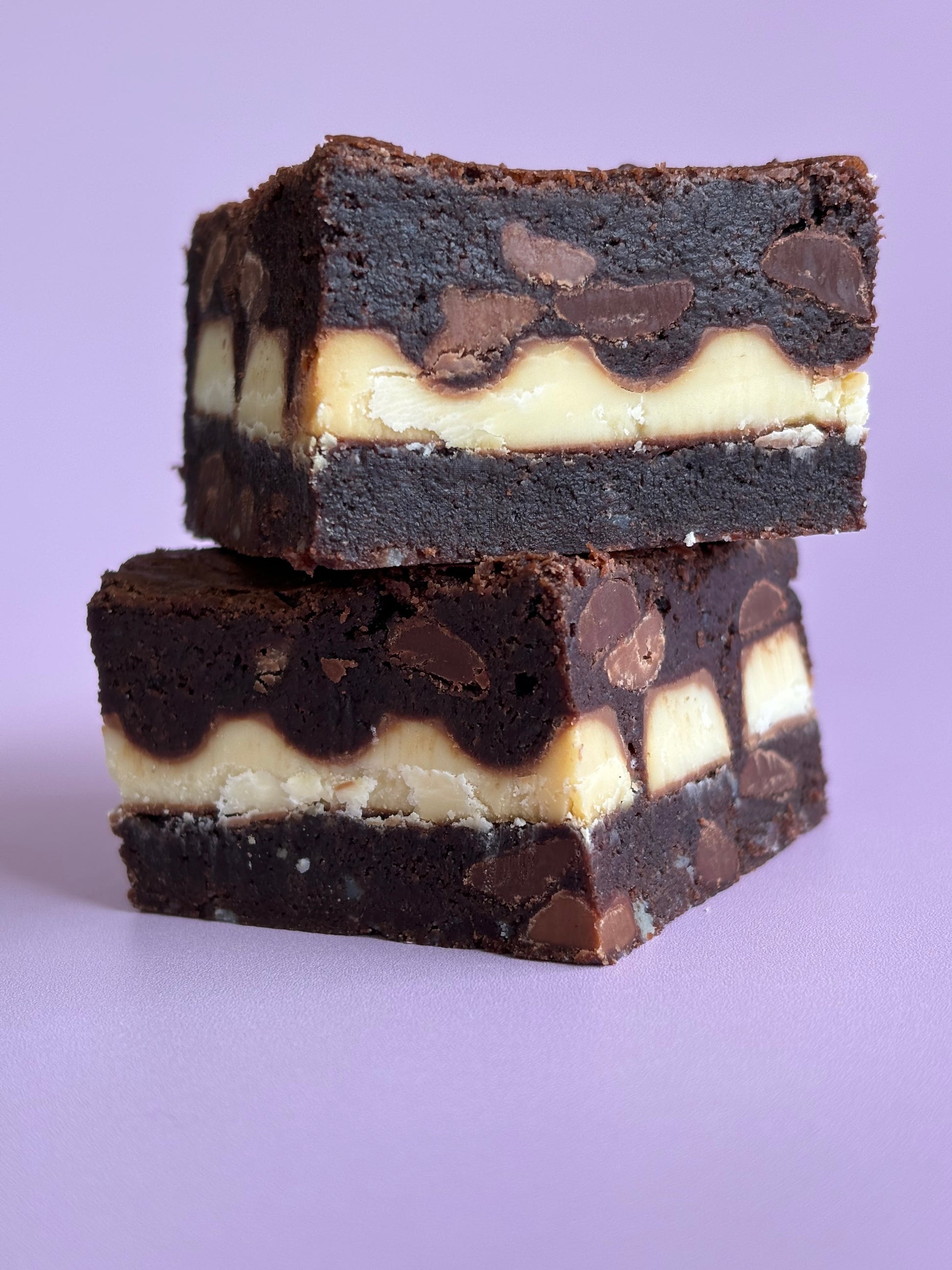 Fudgy chocolate gluten-friendly brownies stuffed with a layer of Kinder chocolate bars