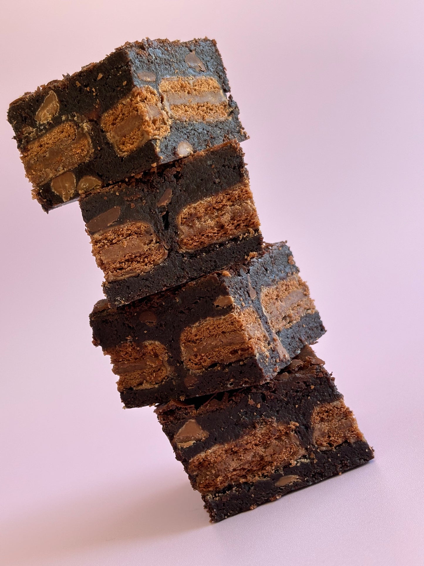 Fudgy chocolate gluten-friendly brownies stuffed with a layer of gluten-free Tim Tam biscuits.