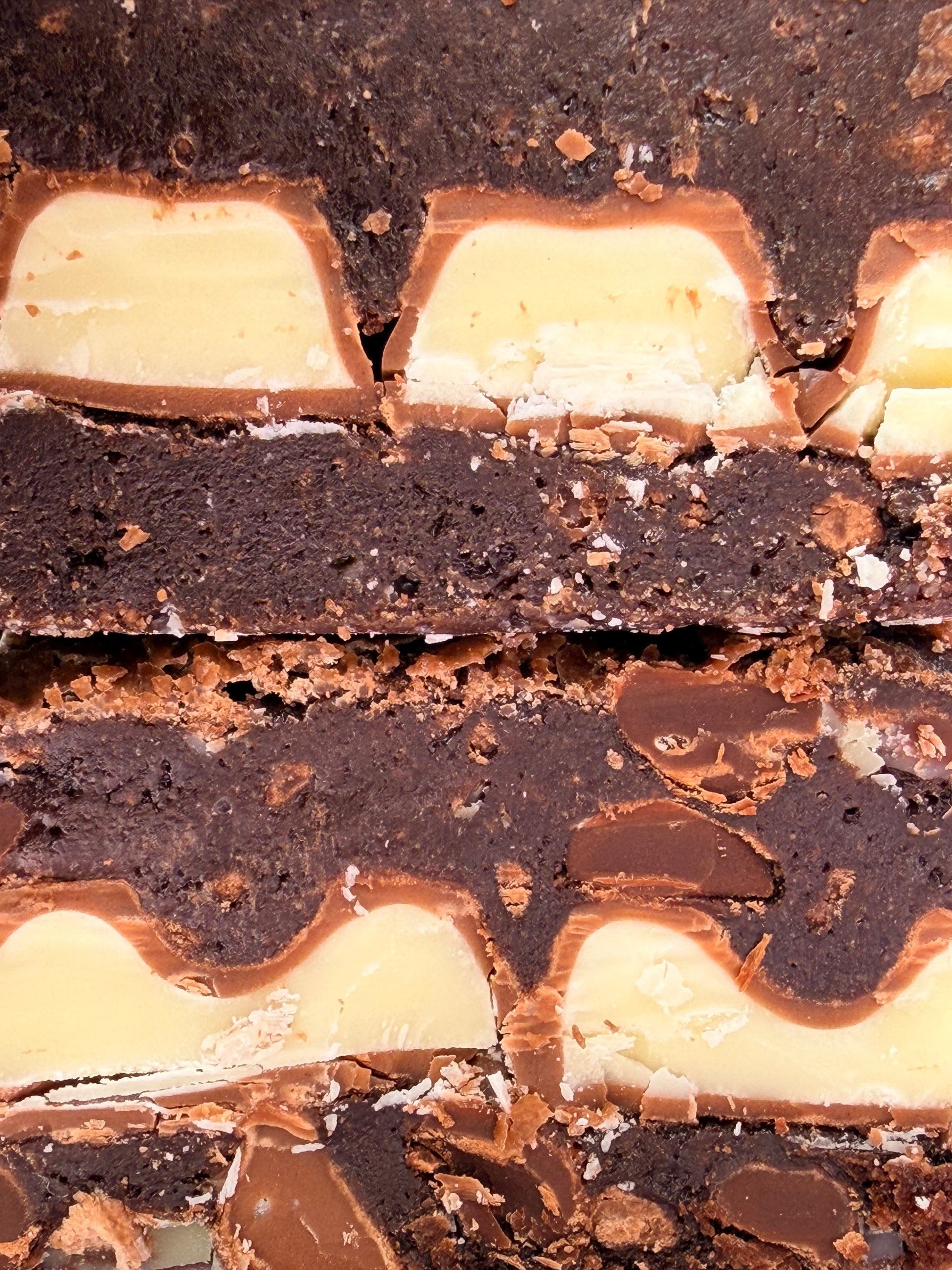 Fudgy chocolate brownies stuffed with a layer of Kinder chocolate bars