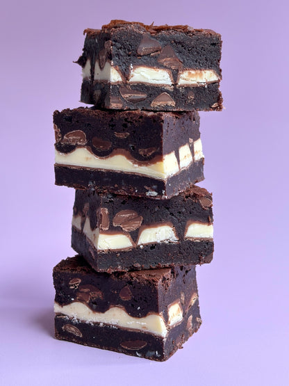 Fudgy chocolate brownies stuffed with a layer of Kinder bars.
