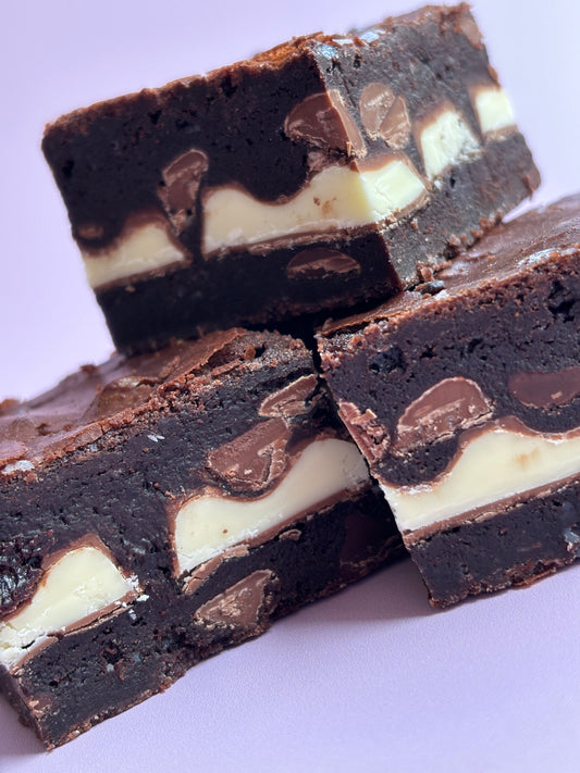 Fudgy chocolate brownies stuffed with a layer of Kinder bars.