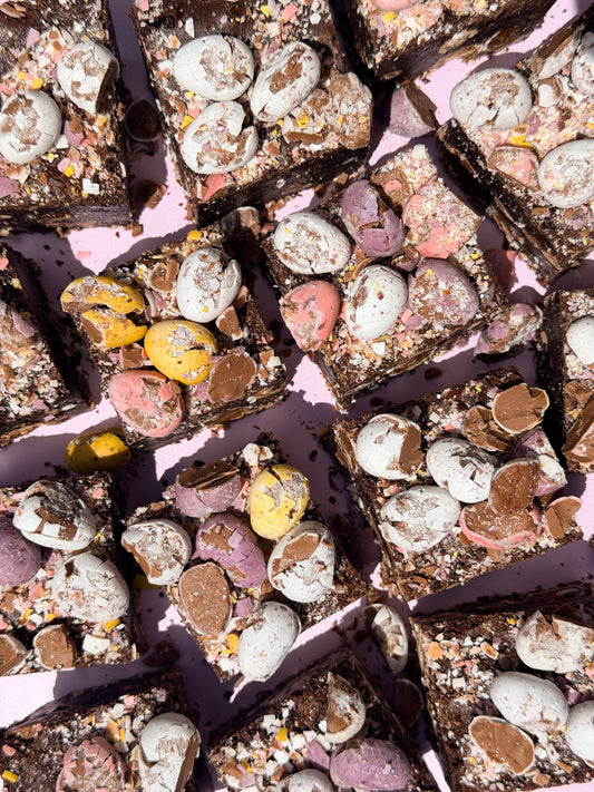 Fudgy chocolate brownies loaded with Cadbury Mini Eggs on top