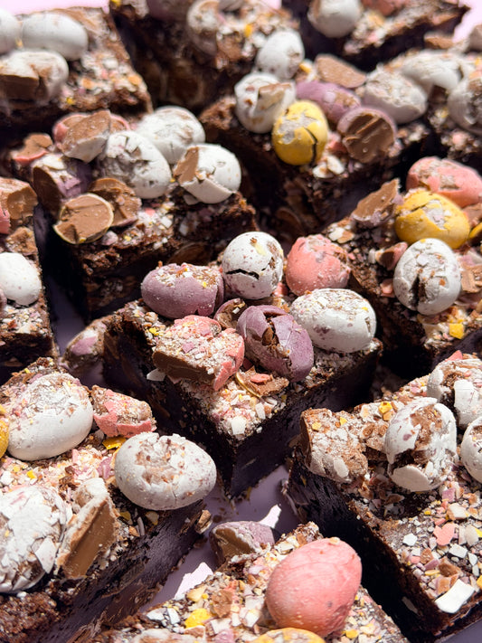 Fudgy gluten-friendly chocolate brownies loaded with Cadbury Mini Eggs on top