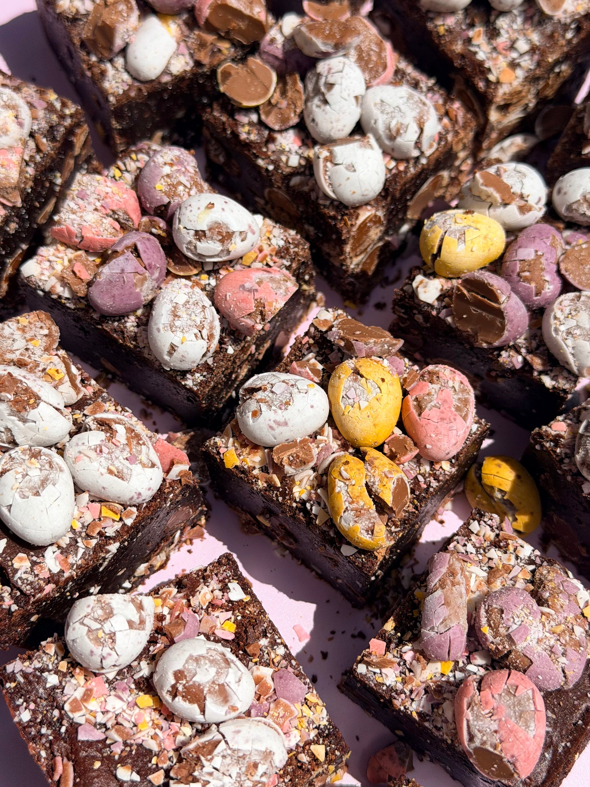 Fudgy gluten-friendly chocolate brownies loaded with Cadbury Mini Eggs on top