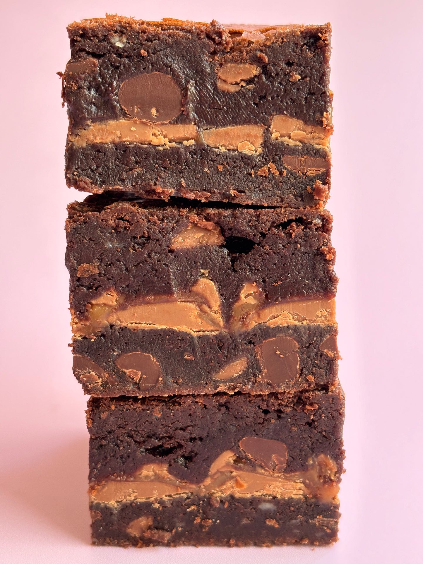 Fudgy chocolate brownies stuffed with a layer of gooey Rolo chocolate.