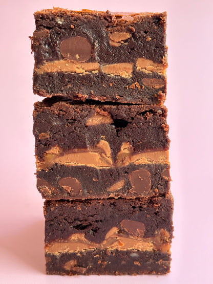 Fudgy chocolate brownies stuffed with a layer of gooey Rolo chocolate.