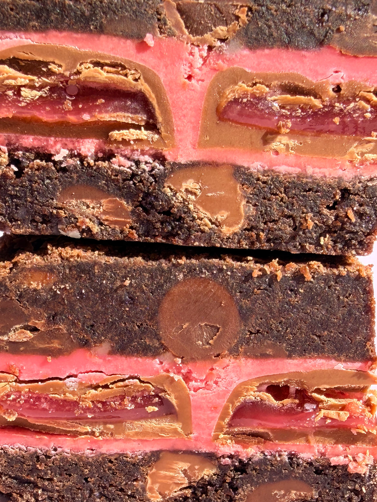 Fudgy chocolate brownies stuffed with a layer of Strawberry Freddo's and strawberry-flavoured spread