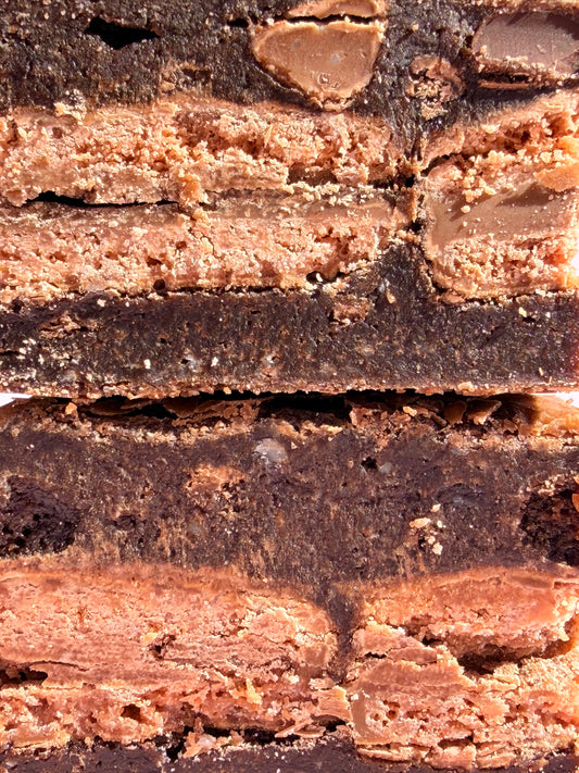 Fudgy chocolate brownies stuffed with a layer of Tim Tam biscuits