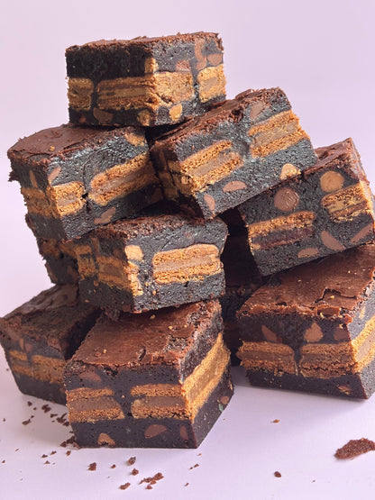 Fudgy chocolate brownies stuffed with a layer of Tim Tam biscuits
