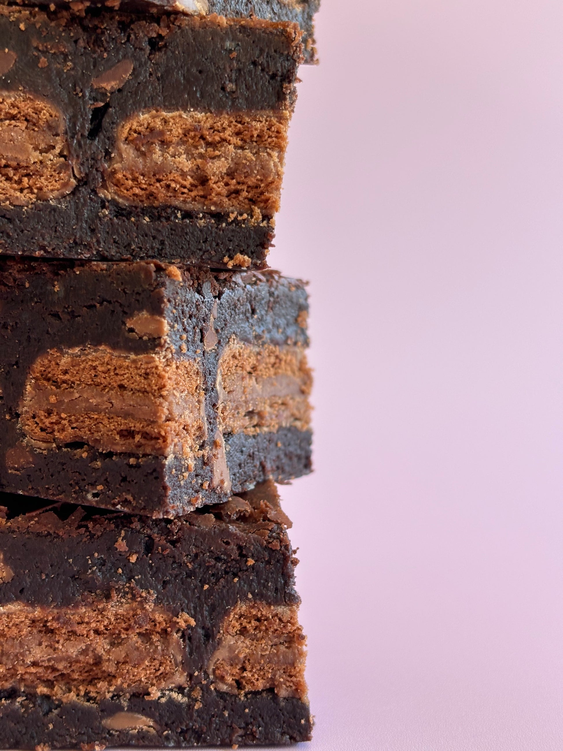 Fudgy chocolate brownies stuffed with a layer of Tim Tam biscuits