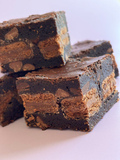 Fudgy chocolate brownies stuffed with a layer of Tim Tam biscuits