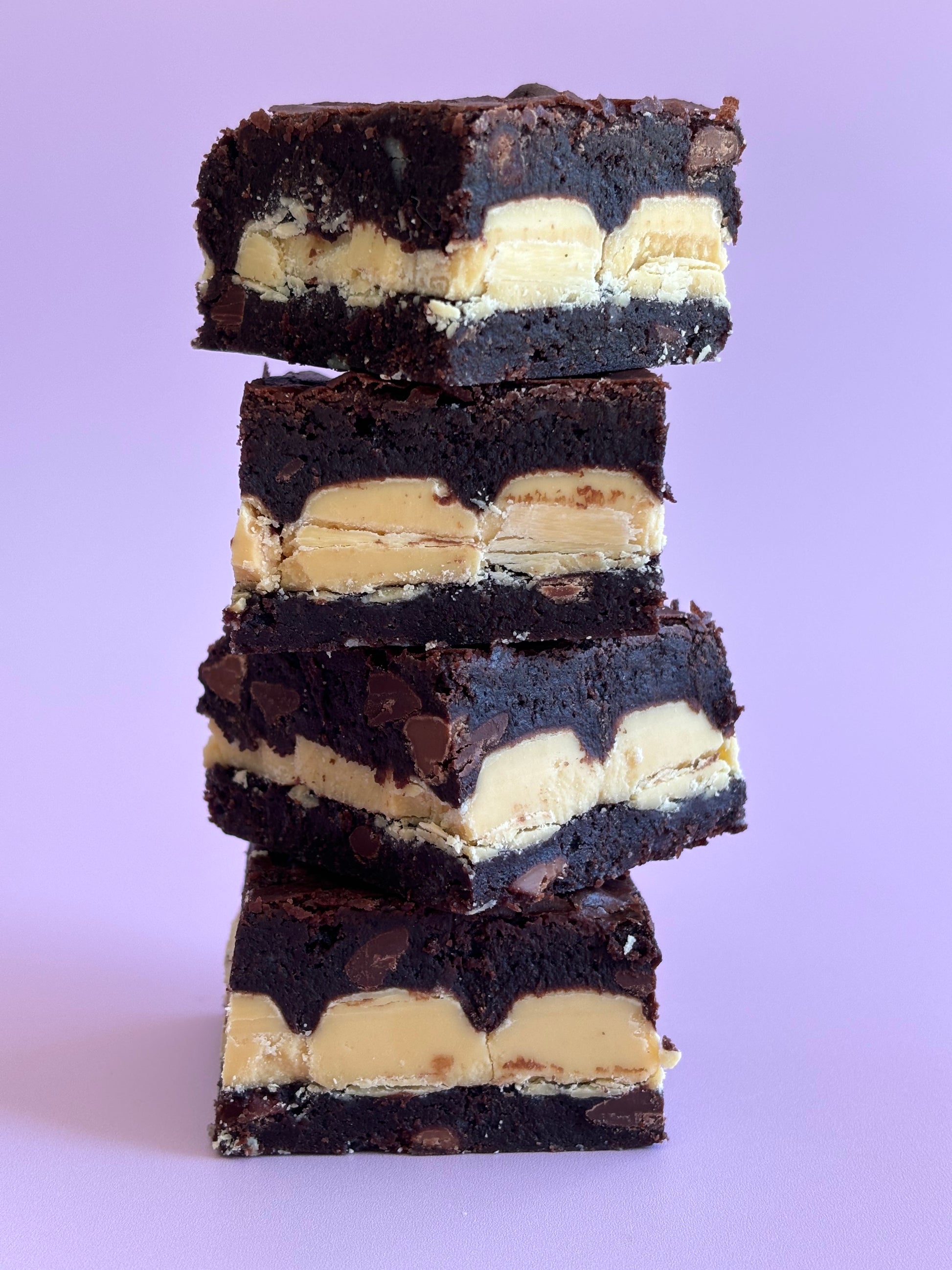 Decadent chocolate brownies stuffed with a layer of white chocolate blocks