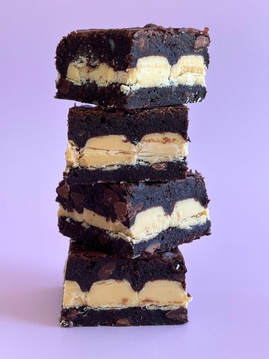 Decadent chocolate brownies stuffed with a layer of white chocolate blocks